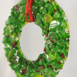 Handmade glass Christmas wreath decoration with red ribbon, made in Scotland